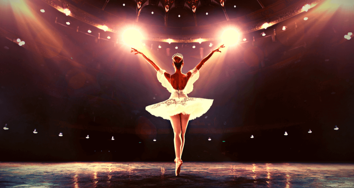 alt = "a ballerina uses pointe technique performing in april 2022 in south florida"