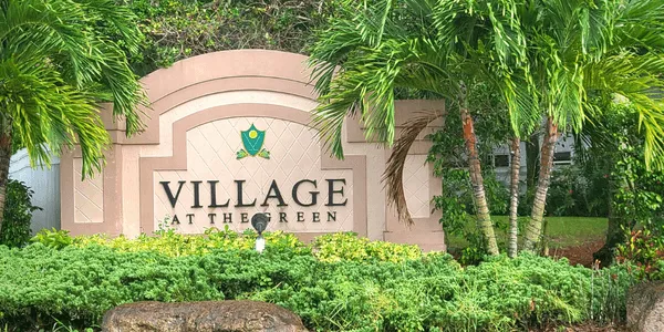 Village-at-The-Green-Sign - Real-ativity